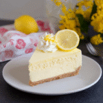 Instant Pot Keto Cheesecake topped with lemon zest and cream